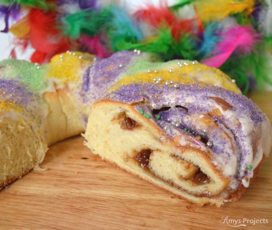 Mmmm delicious homemade King Cake to celebrate Mardi Gras.  This King Cake recipe brings the flavors of NOLA to your kitchen and party.