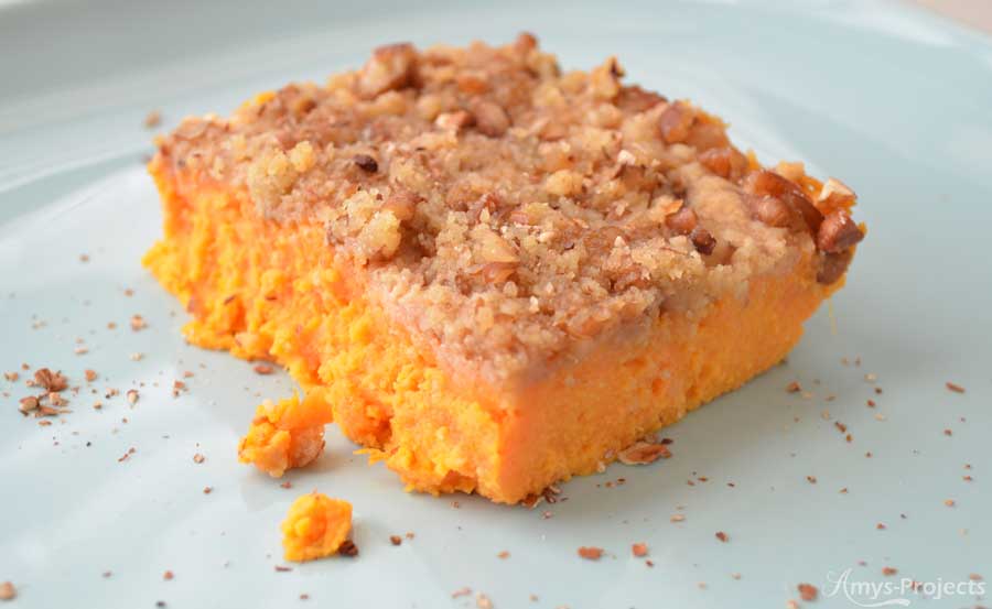 A delicious sweet potato casserole recipe topped with yummy pecans.